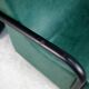 Pair of armrest heaters. Steel and green imitation leather. France, circa 1980