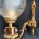 Pair of bronze wall sconces in Empire/Napoleon III style.