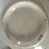 Two large vintage bowls in pastel decor on mini pedestals.