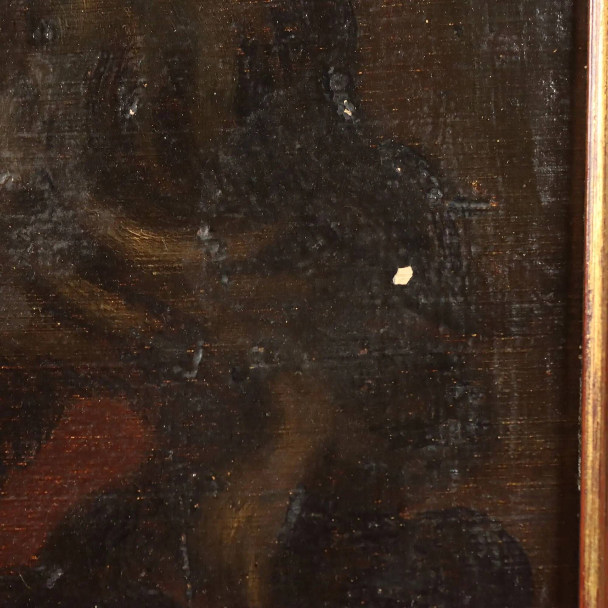 Old painting of a male face in oil on cardboard from the 19th century.