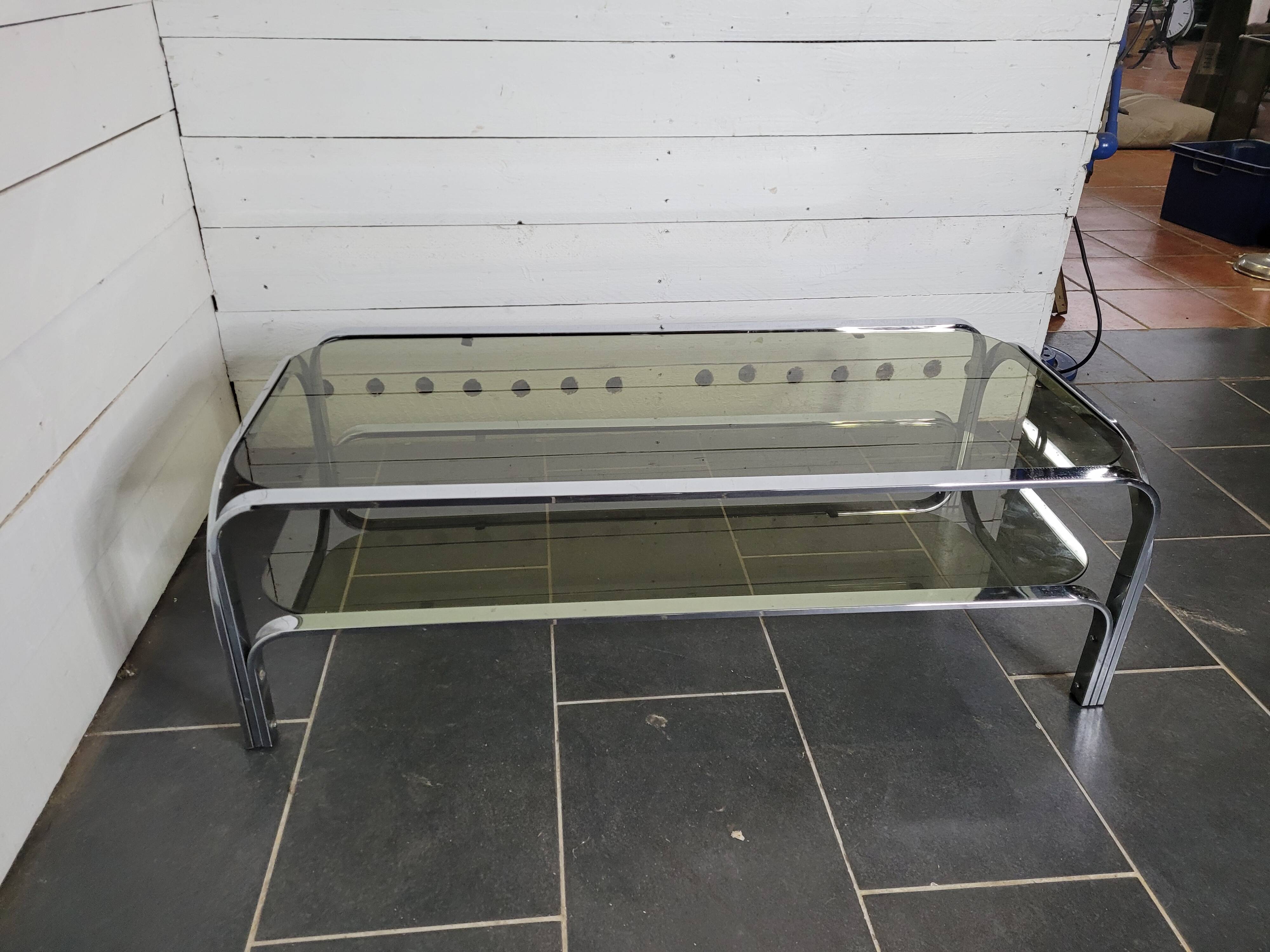 Chromed metal coffee table with smoked glass top from the 70s
