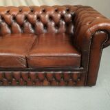 Brown leather chesterfield sofa