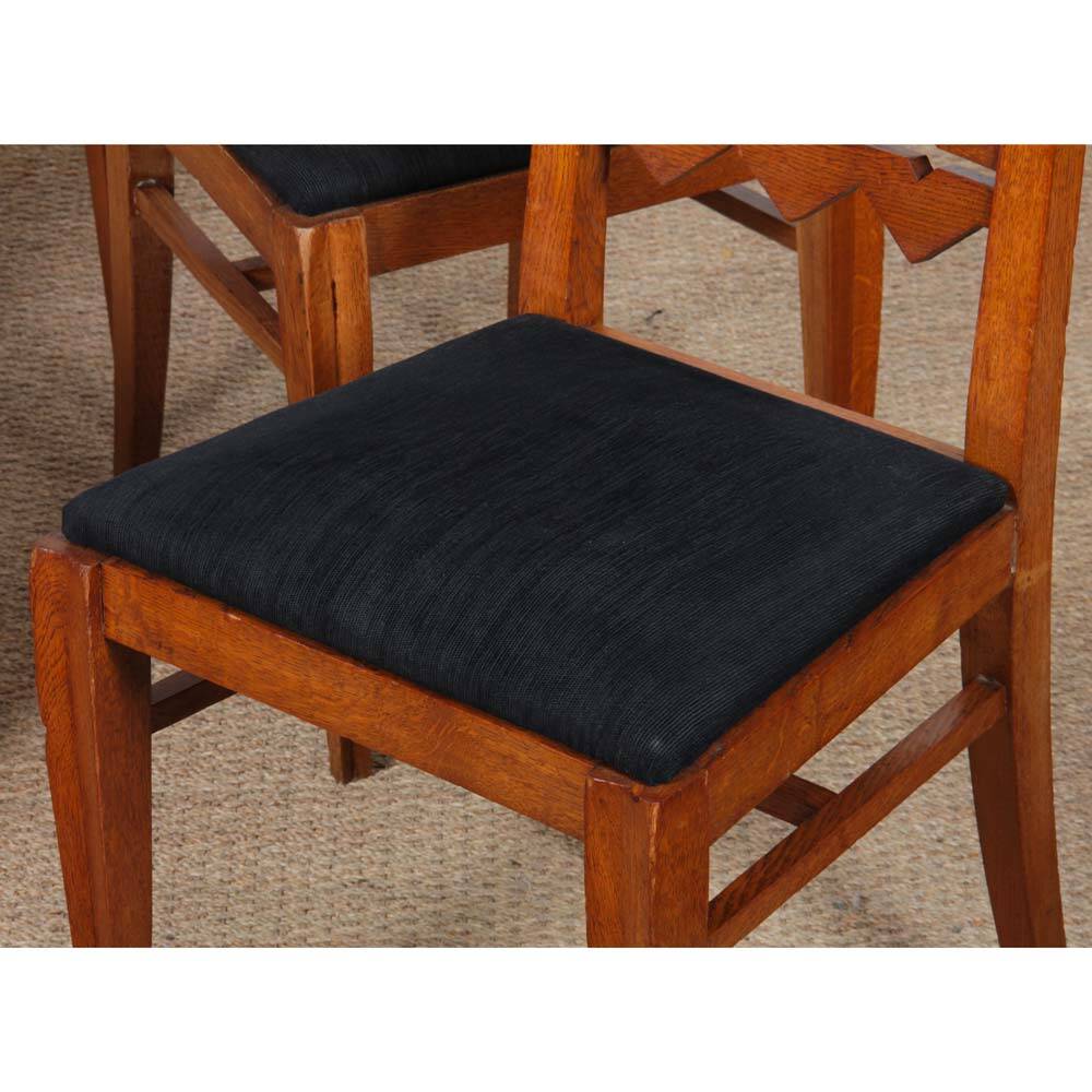 Set of 4 solid oak chairs from the 1950s.
