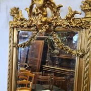 Miroir avec un ange en bois doré et stuc 166x61cm