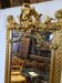 Mirror with an angel in gilded wood and stucco 166x61cm