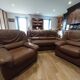 three-seater sofa and two armchairs