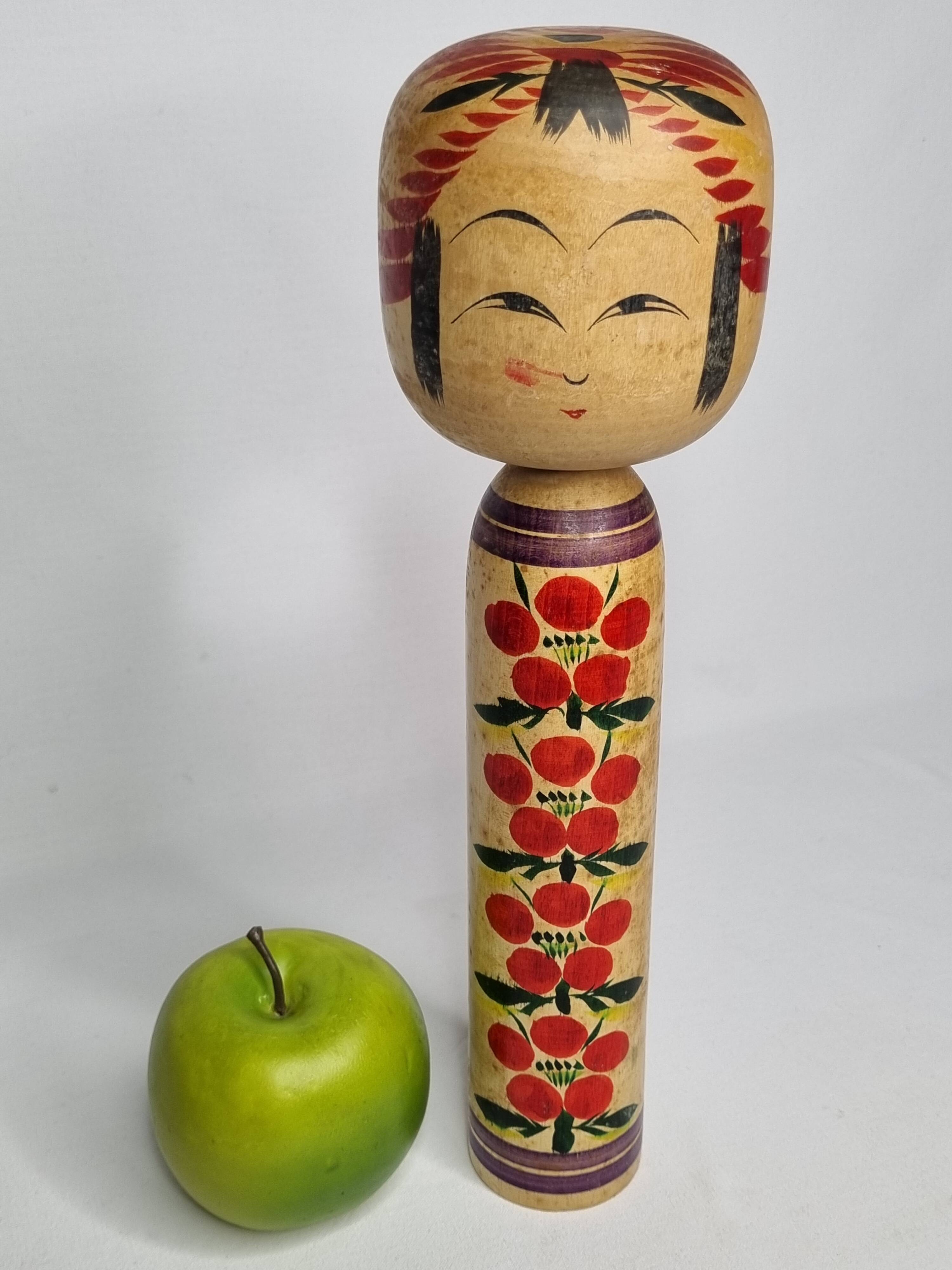 Vintage Japanese Kokeshi doll dated 1986, signed and numbered, floral decoration, 34 cm