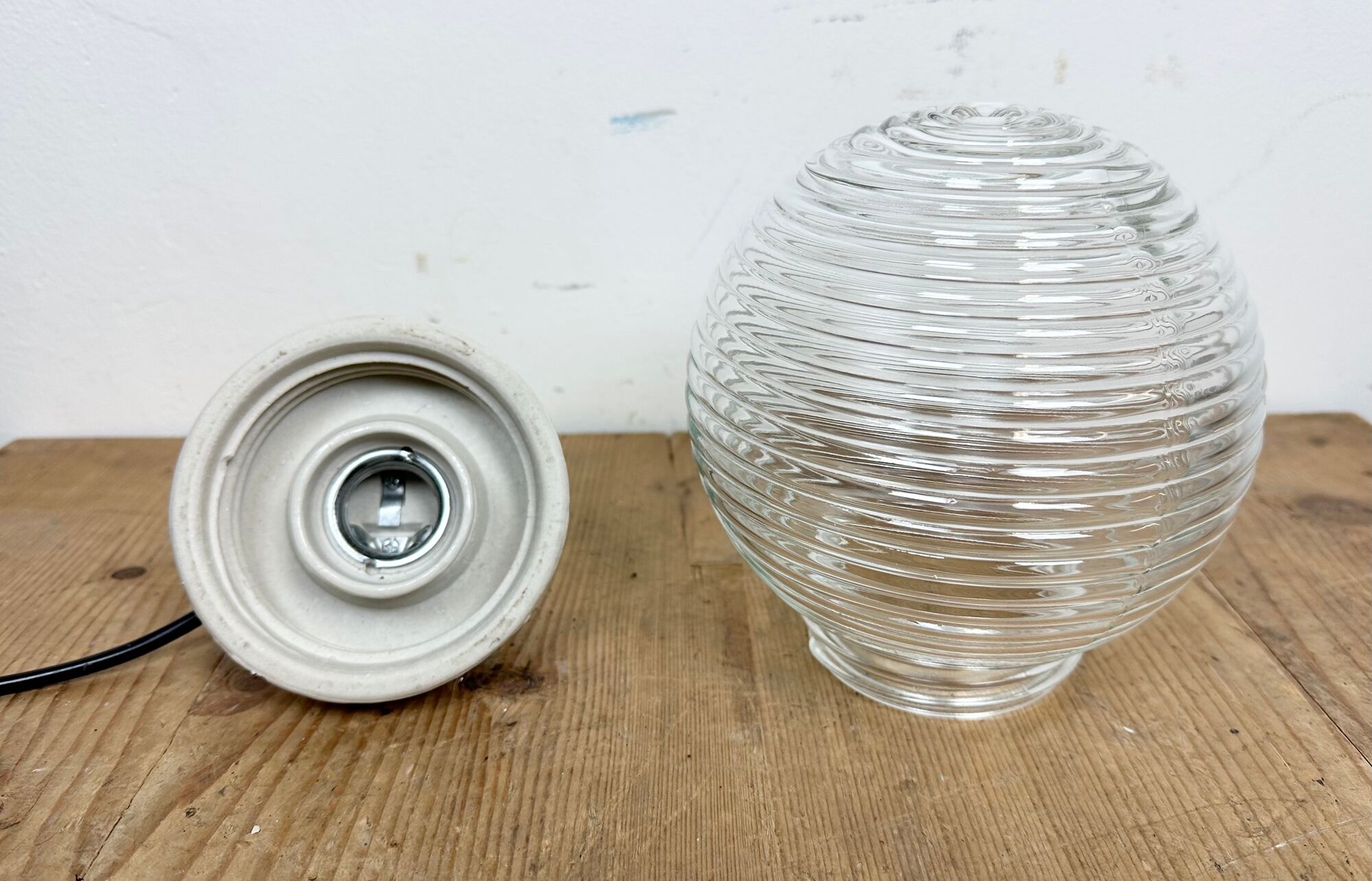 Industrial porcelain red enamel pendant light with ribbed clear glass, 1970s