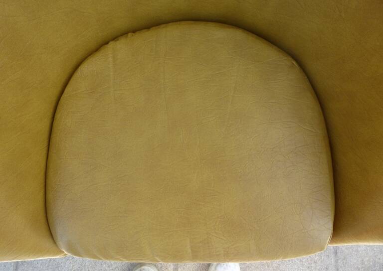 Vintage swivel armchair from the 70s in imitation leather