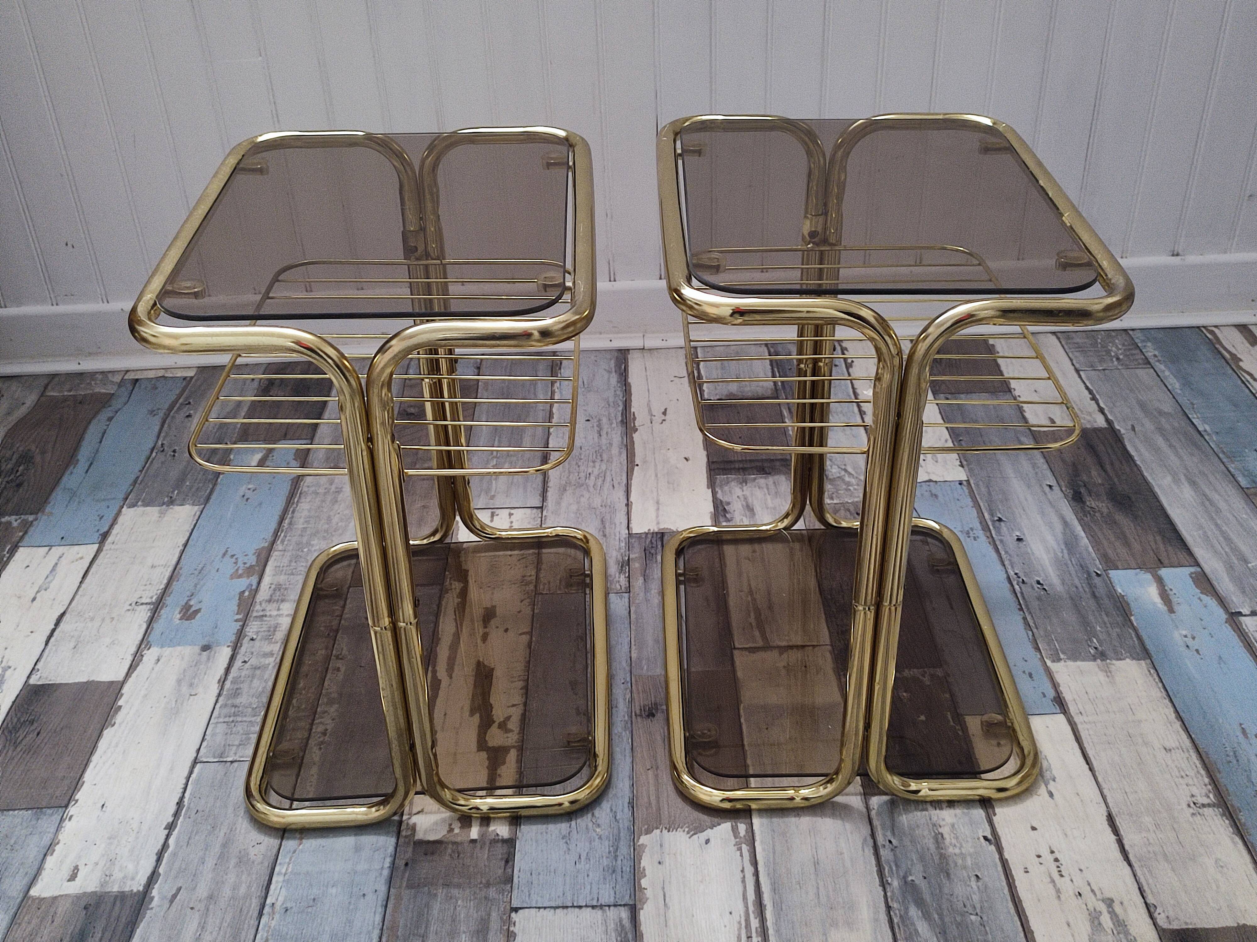 Pair of vintage smoked glass and brass bedside tables
