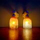 Pair of Art Deco wall sconces in multicoloured porcelain and frosted glass.