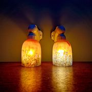 Pair of Art Deco wall sconces in multicoloured porcelain and frosted glass.