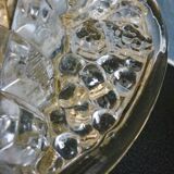 Thick, molded glass ear vase, art deco period and style, stylized leaves and grapes
