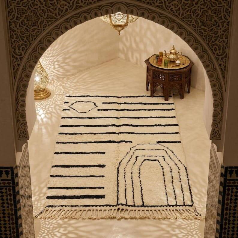 Handwoven natural wool Berber rug in black and white, 150/250 cm.