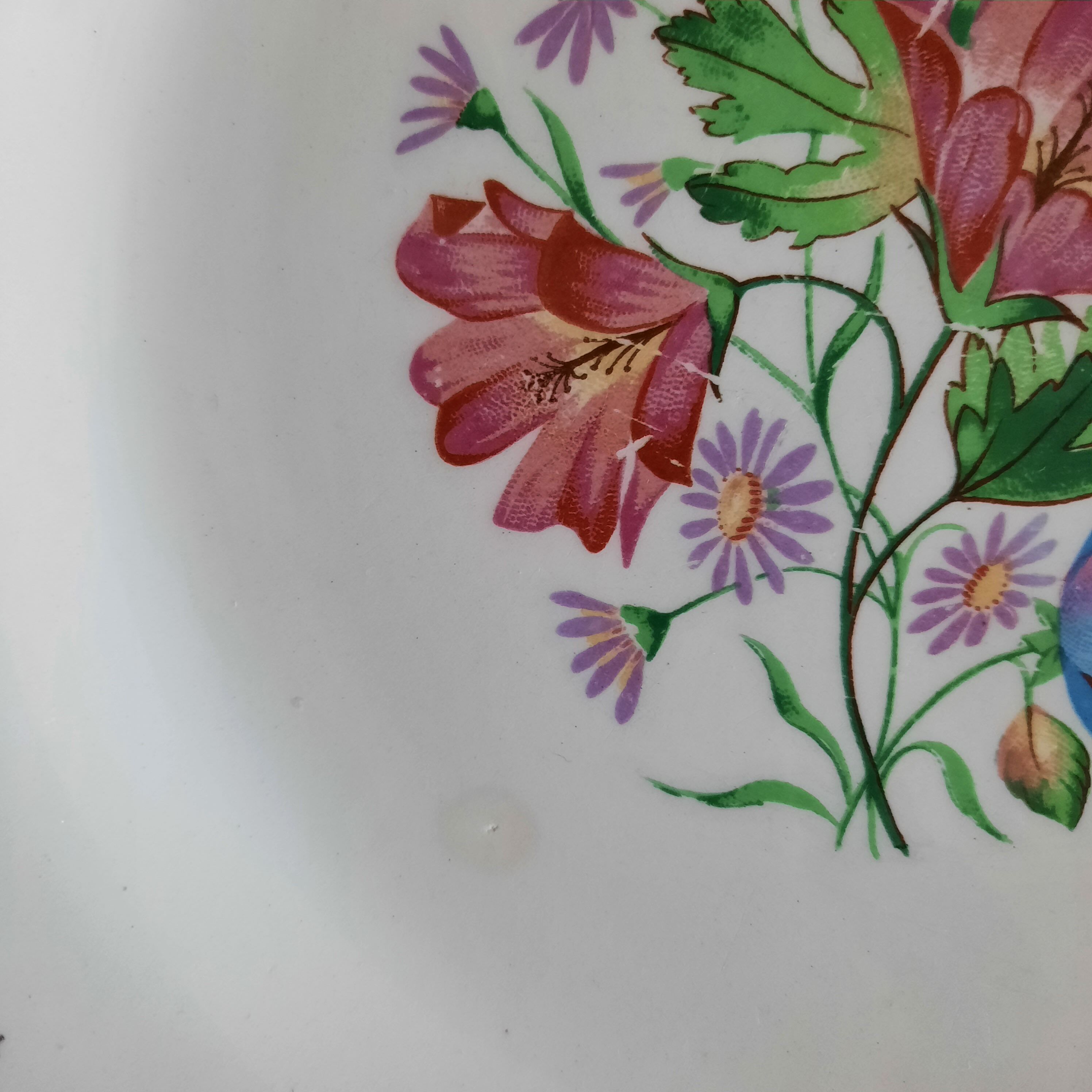 Pitted old flat earthenware plates with gold