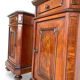 A pair of antique walnut bedside tables from the 1890s.