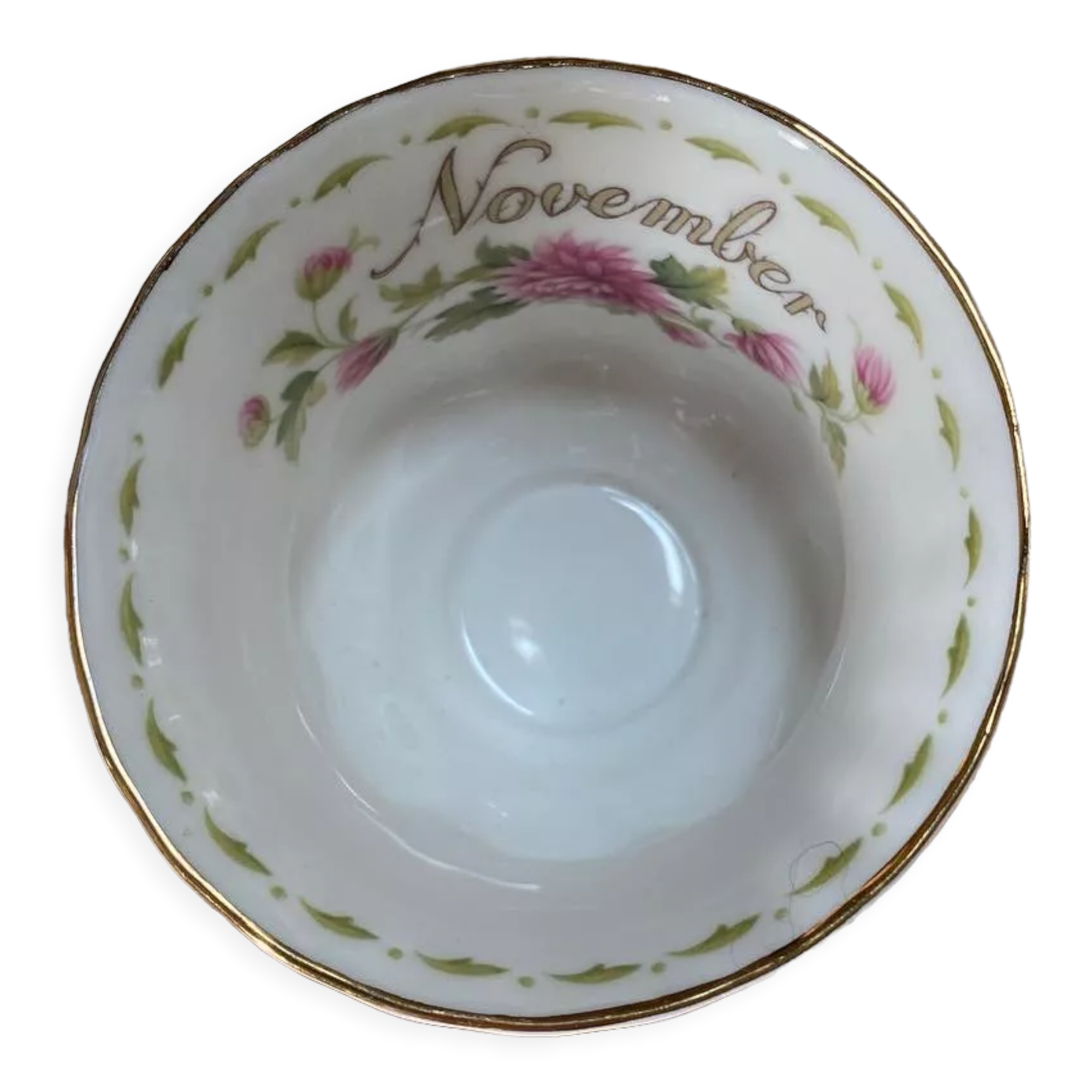 Porcelain cup and sub-cup "November" stamped "Royal Albert"