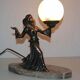 Art deco lamp in regul and marble "woman holding a globe"