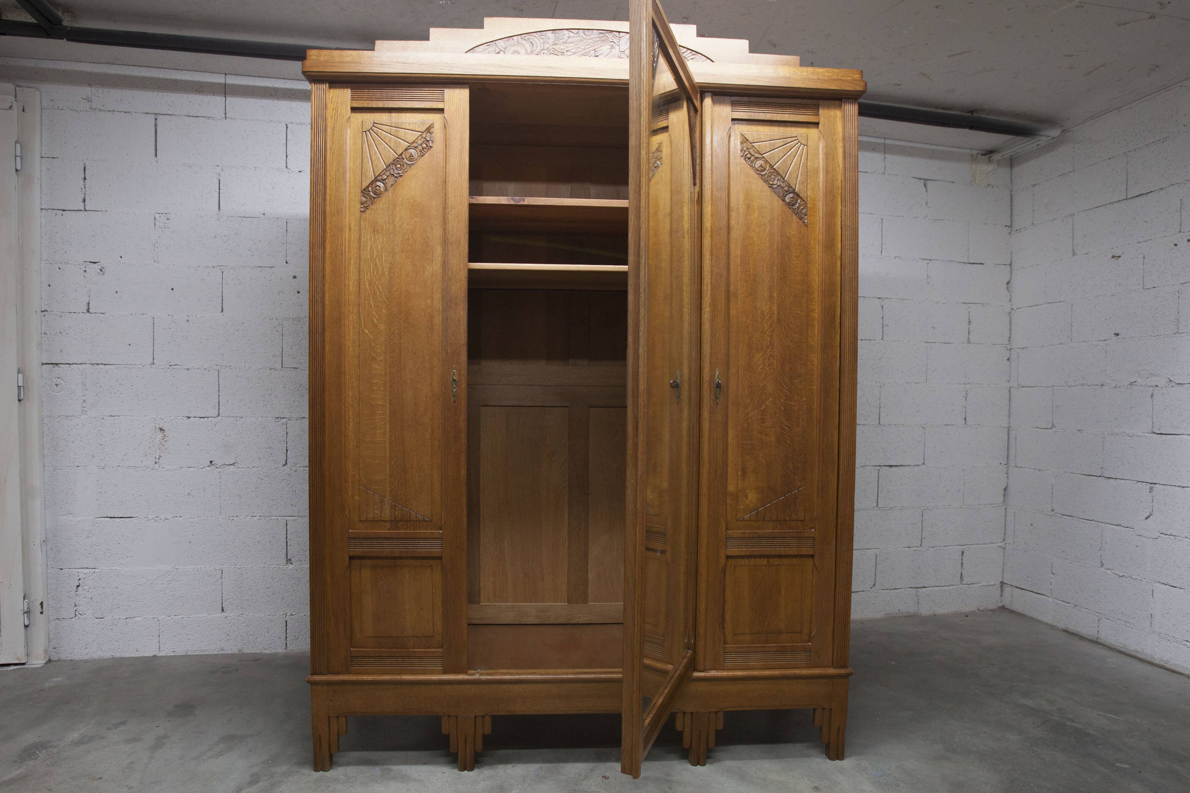 Art Deco carved oak wardrobe - Flemish workshop circa 1930