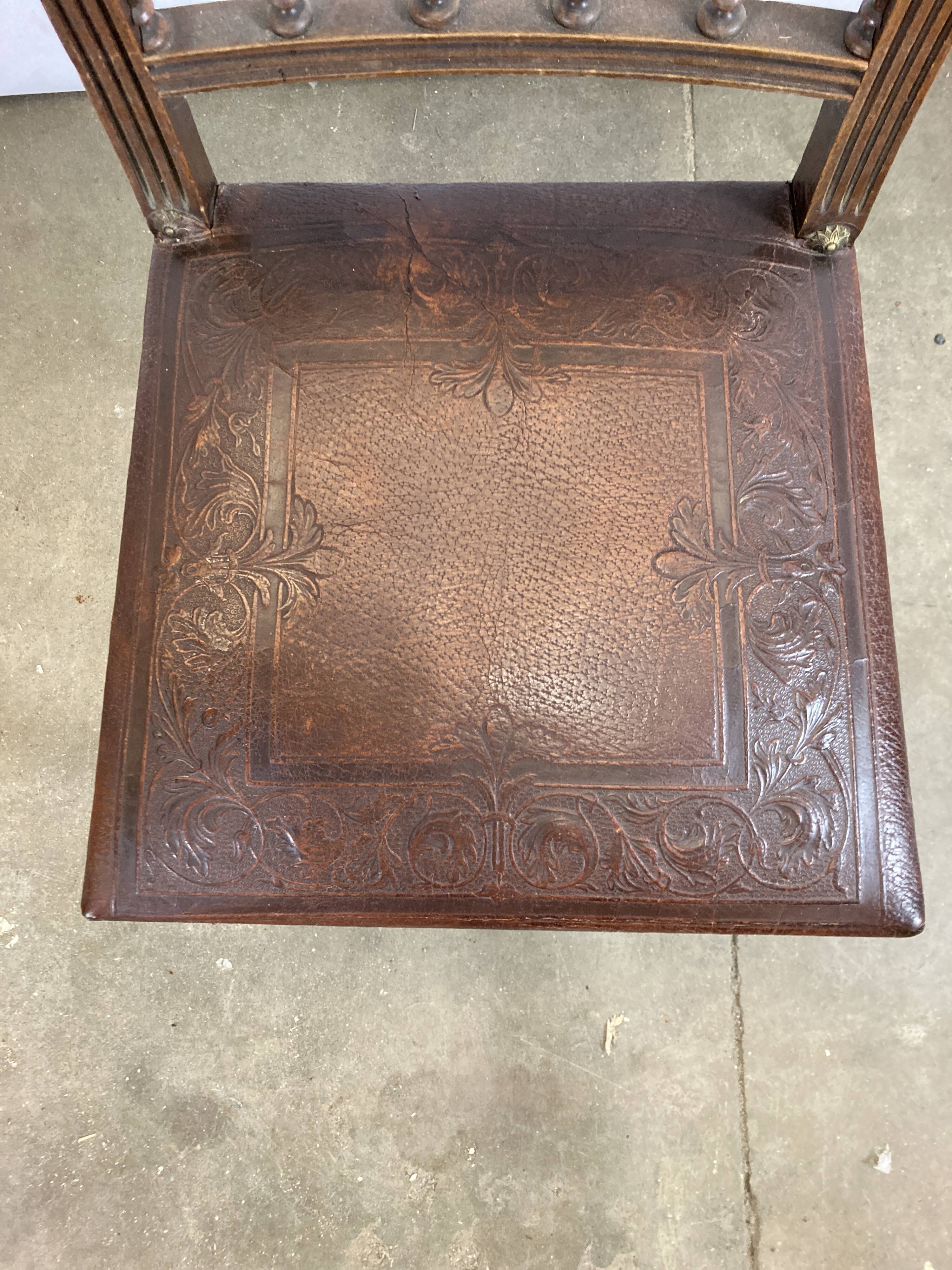 Pair of Henry II wooden and leather chairs