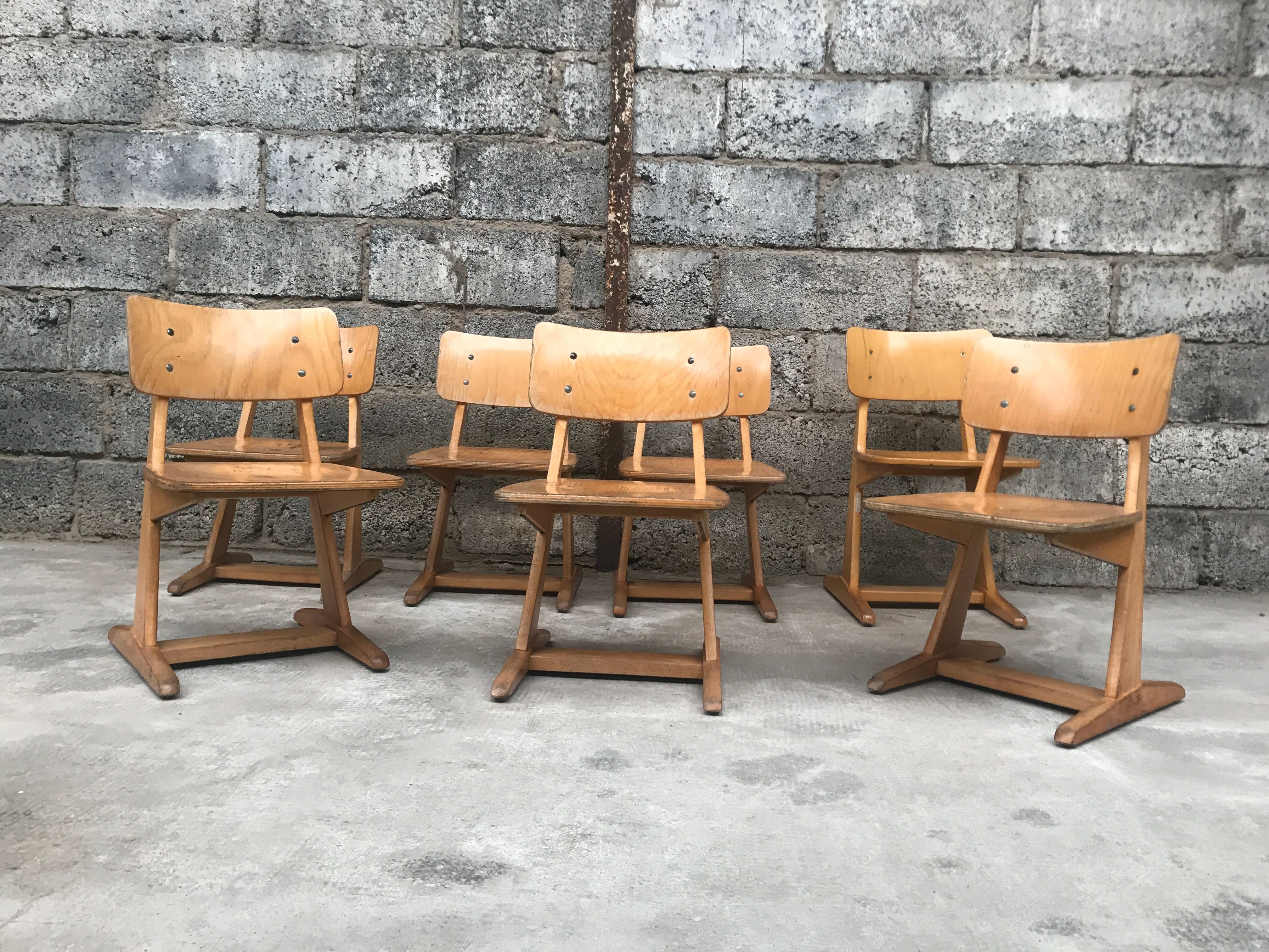 Series of 10 casala children's chairs in vintage light wood