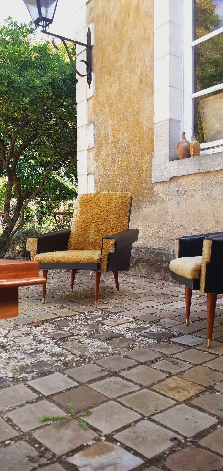 Pair of vintage 60s armchairs in black imitation leather and mustard toffee