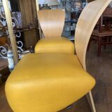 Paire de fauteuils bobo en cuir.
