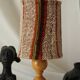 Vintage table lamp made of wood and knitted wool.
