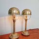 Pair of bronze and brass table lamps, early 20th century