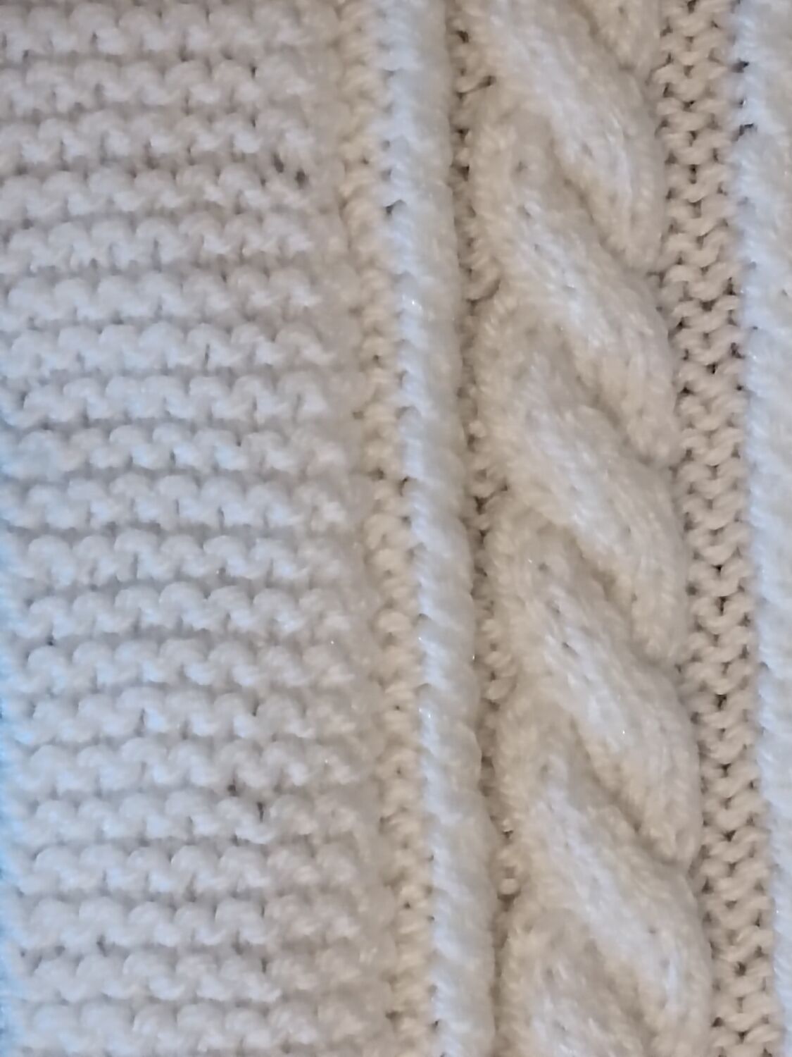 Hand-knitted wool blanket or plaid