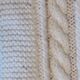 Hand-knitted wool blanket or plaid