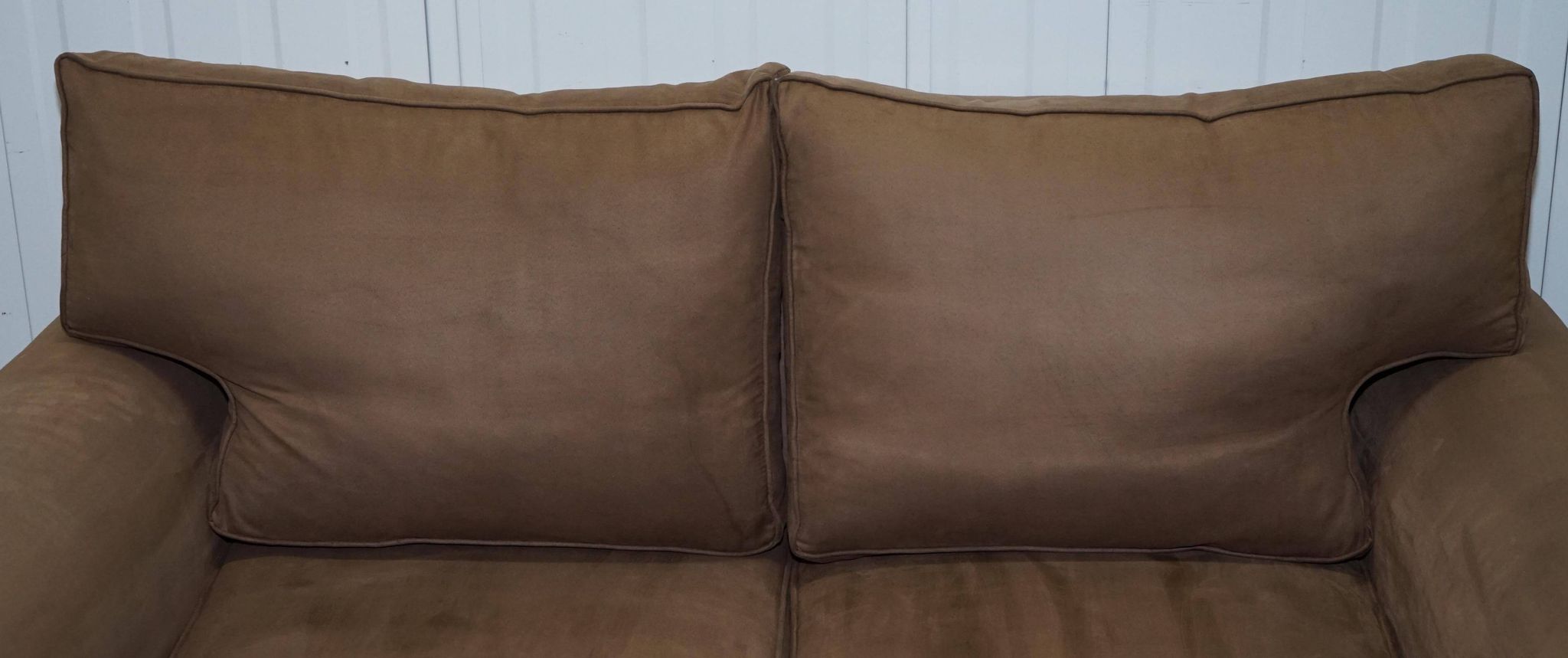 Ralph Lauren Jamaica velvet sofa pair with feather cushions.