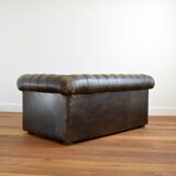 Vintage two-seater leather Chesterfield sofa