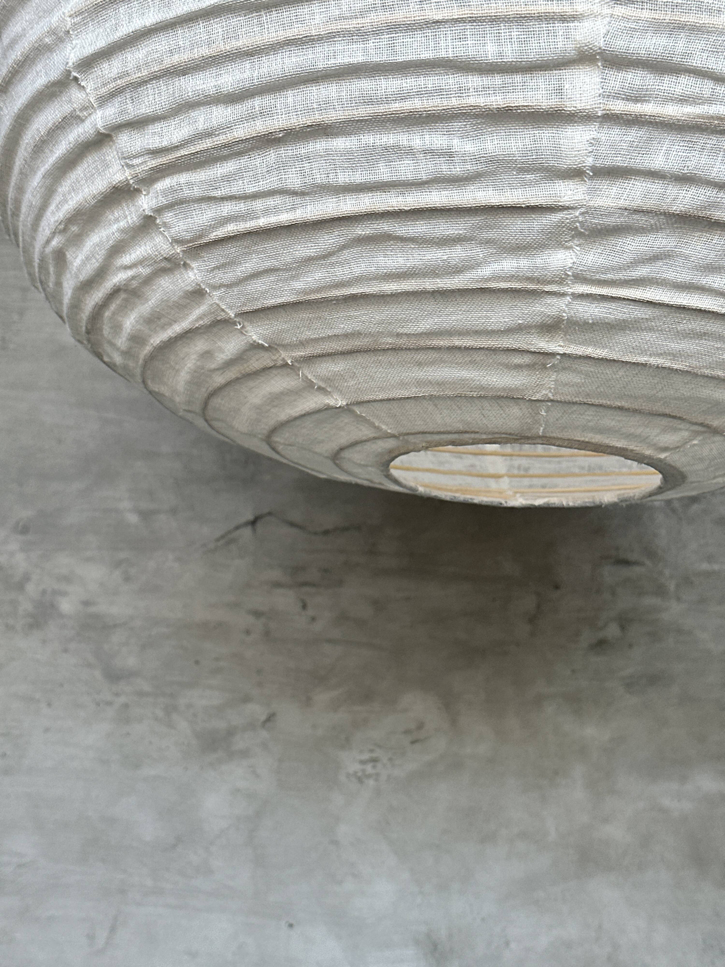 Very large Japanese-style natural rattan and linen pendant light in the shape of a drop H65 D70