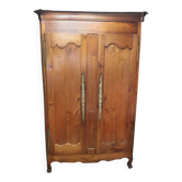 Cherry wood cabinet with caramel patina