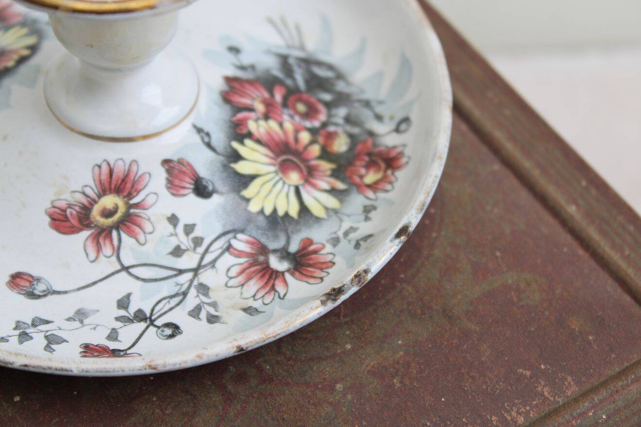 Antique enamel candle holder