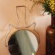 Antique round barber mirror in gilded metal