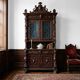 Antique neo-baroque display cabinet carved in walnut, Italy, 19th century