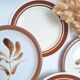 Assiette plates à fleurs marron années 1970