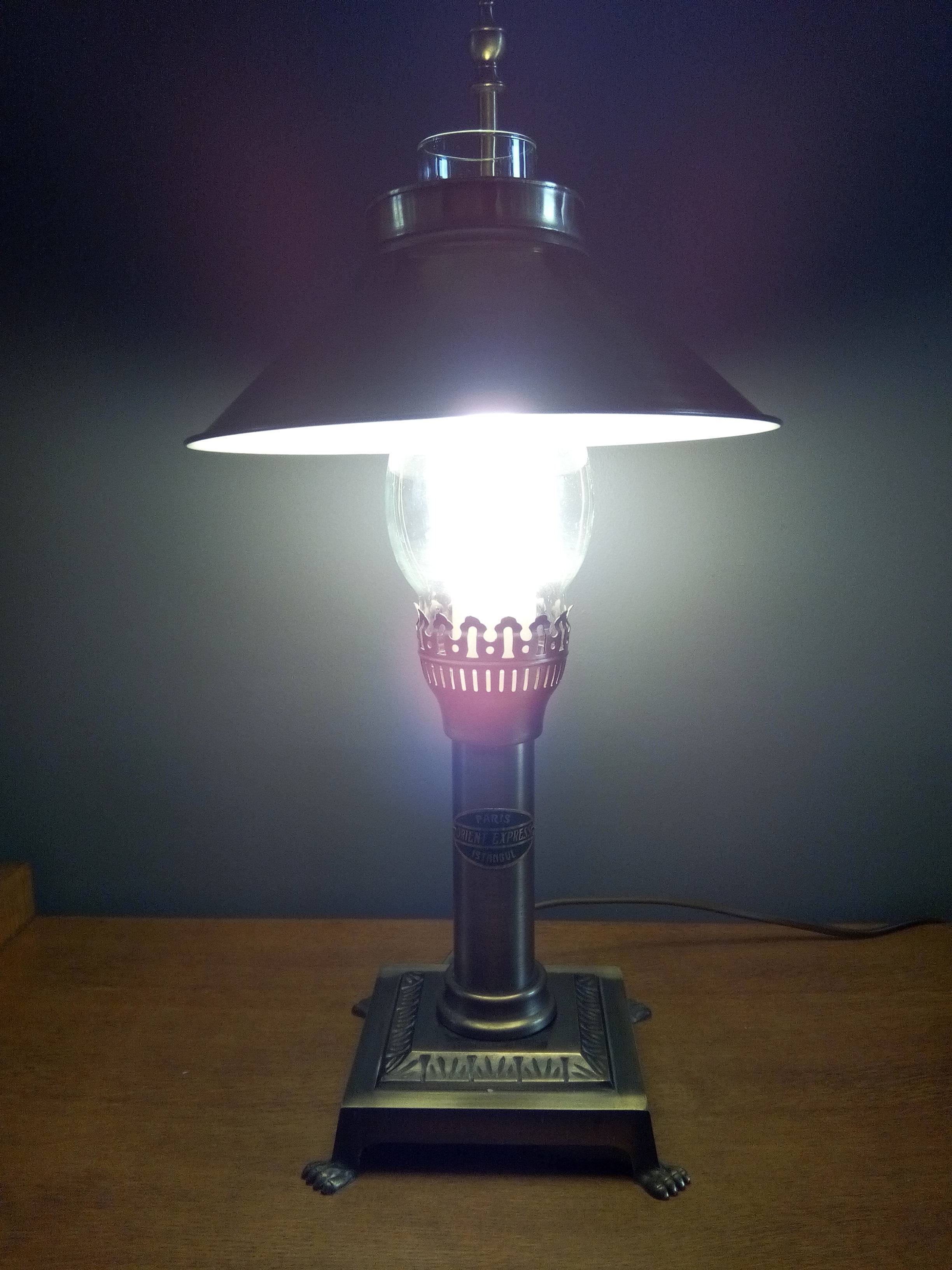 Contemporary pose lamp " orient express " patinated metal