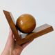 Pair of vintage bookends with polished wooden balls, Art Deco style