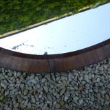 Oval mirror edge marked