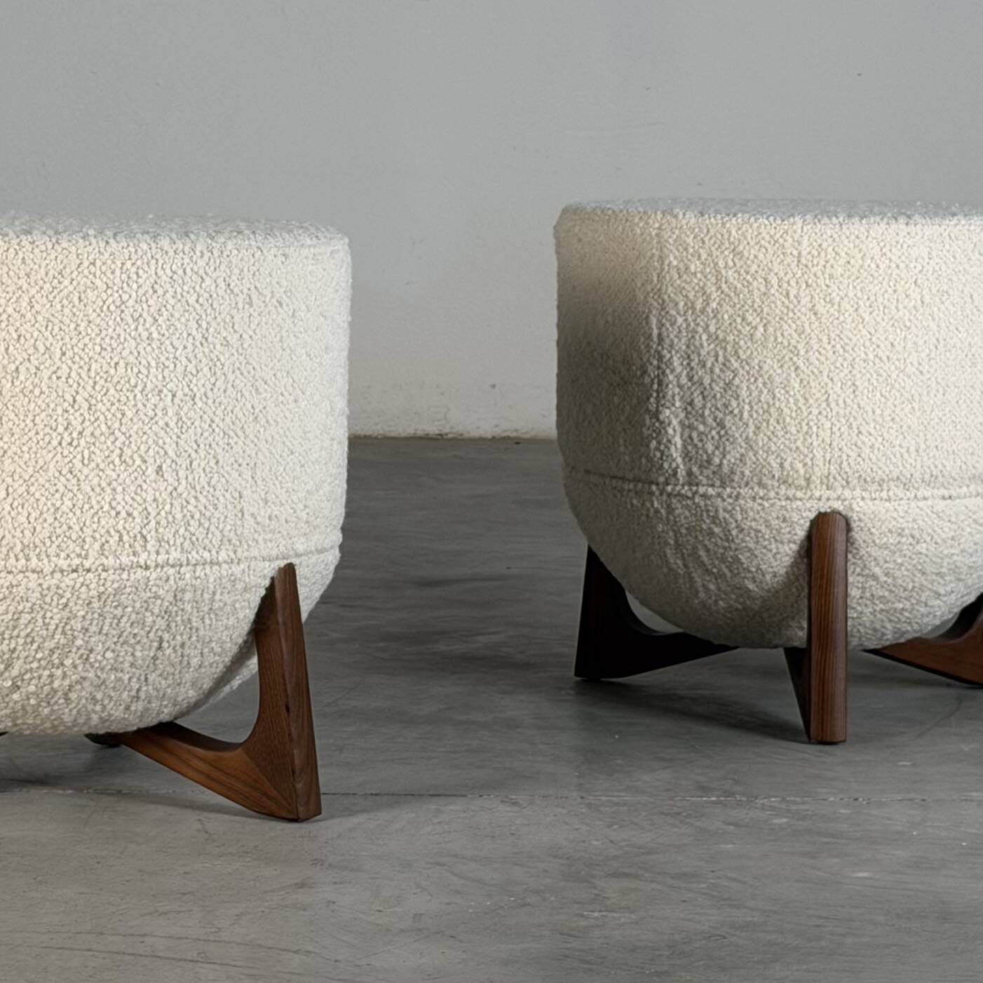 TOTEMO stools by FORME with ivory Dedar bouclé upholstery and walnut legs.