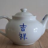 Teapot set and 9 cups with Chinese and French words