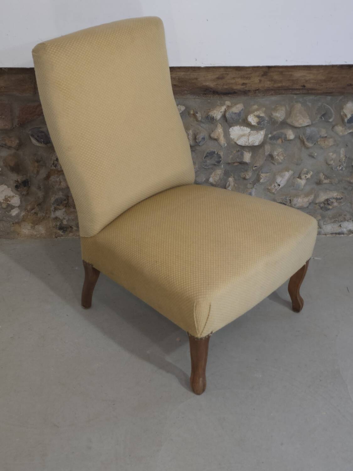 Pale yellow Napoleon III armchair