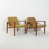 Pair of Danish teak armchairs with green upholstery