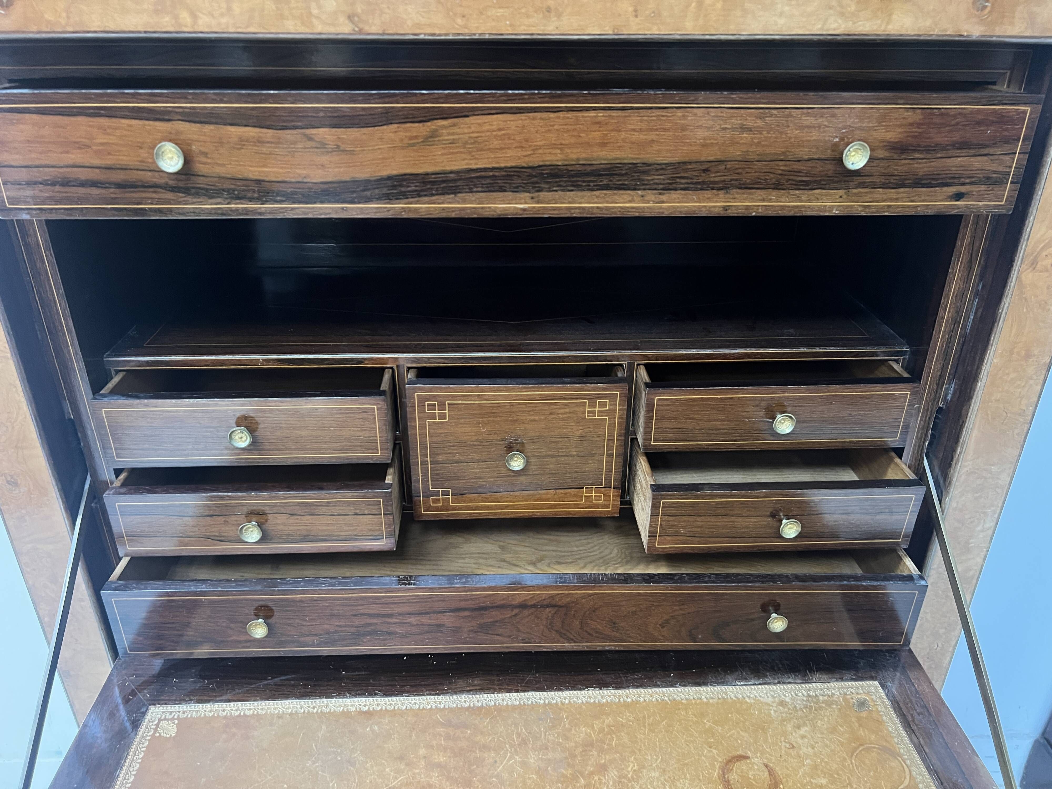 Louis Philippe secretary in light walnut briar, 19th century.