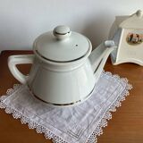 Antique porcelain coffee pot with stamped fire