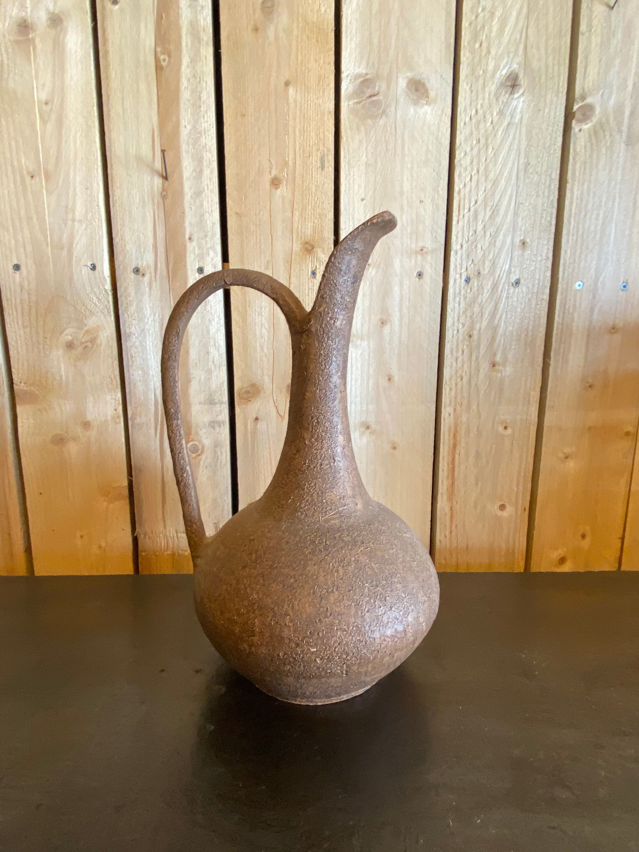 Ceramic pitcher 1970 sign