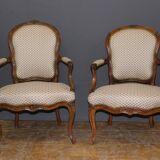 Pair of Louis XV period convertible armchairs